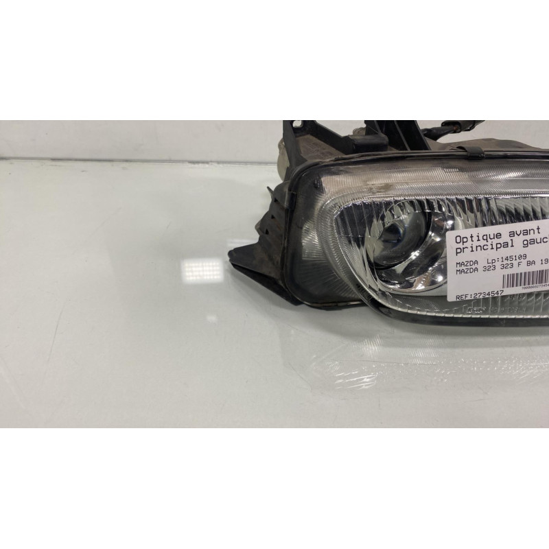 Optique avant principal gauche (feux)(phare) MAZDA 323 6 Photo n°5