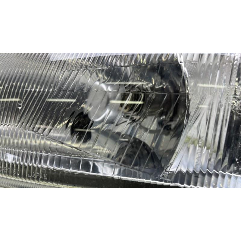 Optique avant principal gauche (feux)(phare) MITSUBISHI COLT 5 Photo n°4