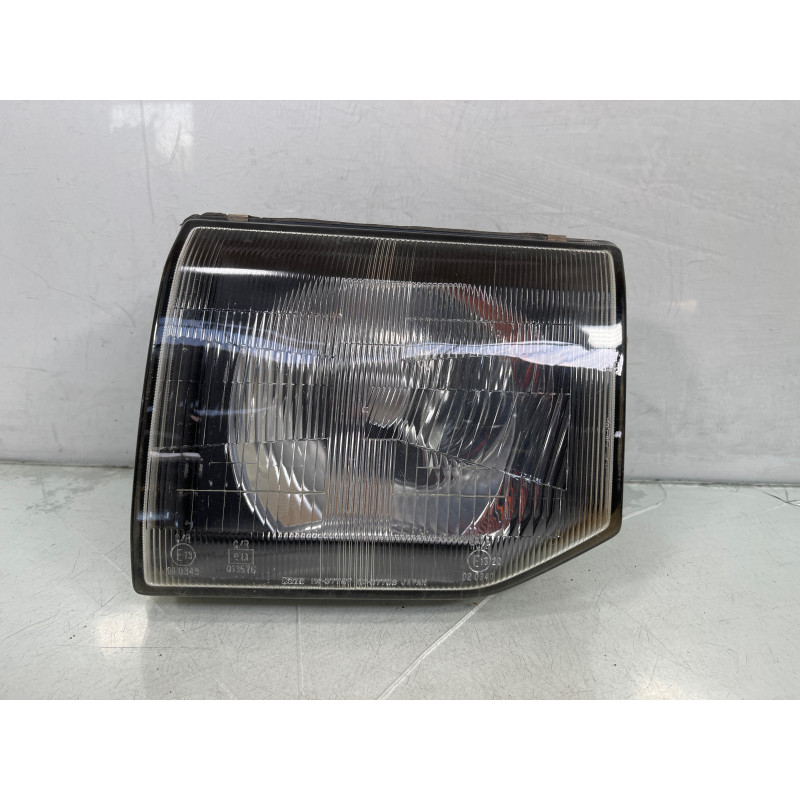 Optique avant principal gauche (feux)(phare) MITSUBISHI PAJERO 2 Photo n°1
