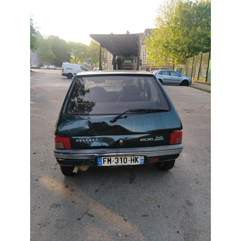 Poignee porte arriere gauche PEUGEOT 205 Photo n°12